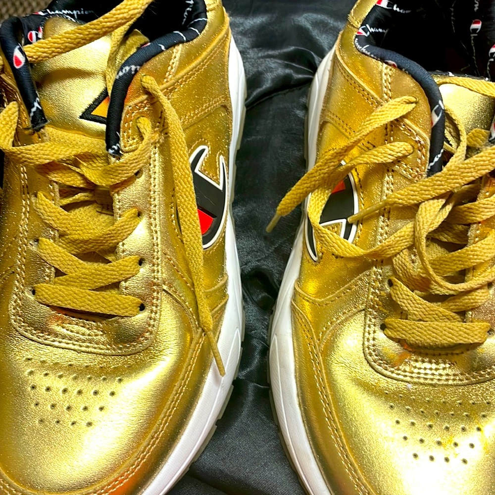 Beautiful champion sneakers, smoke free home , barely worn, great condition